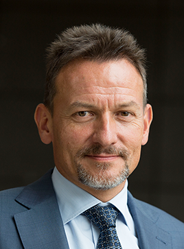 Dr. Christoph Reisinger Hintergrund